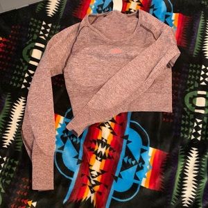 Never worn, long sleeve crop gym shark top